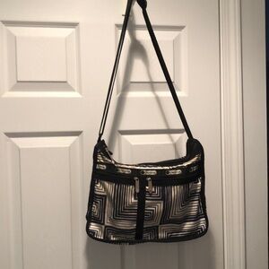 LeSportsac Deluxe Everyday Bag.  Great for travel and for everyday.